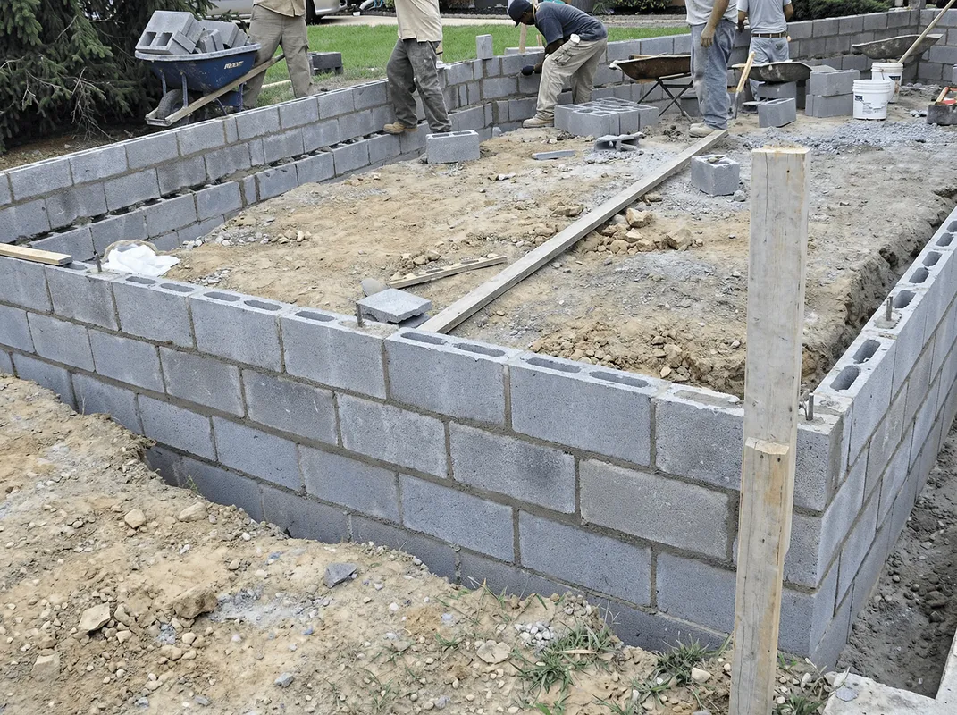 Professionals building a foundation with blocks in Cincinnati, OH