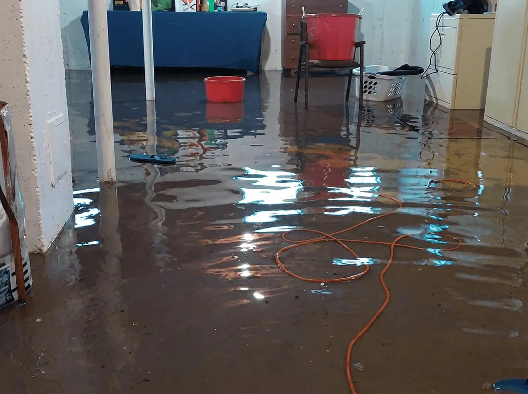 Basement with boiler, cabinets and washing machine completely flooded in Cincinnati, OH